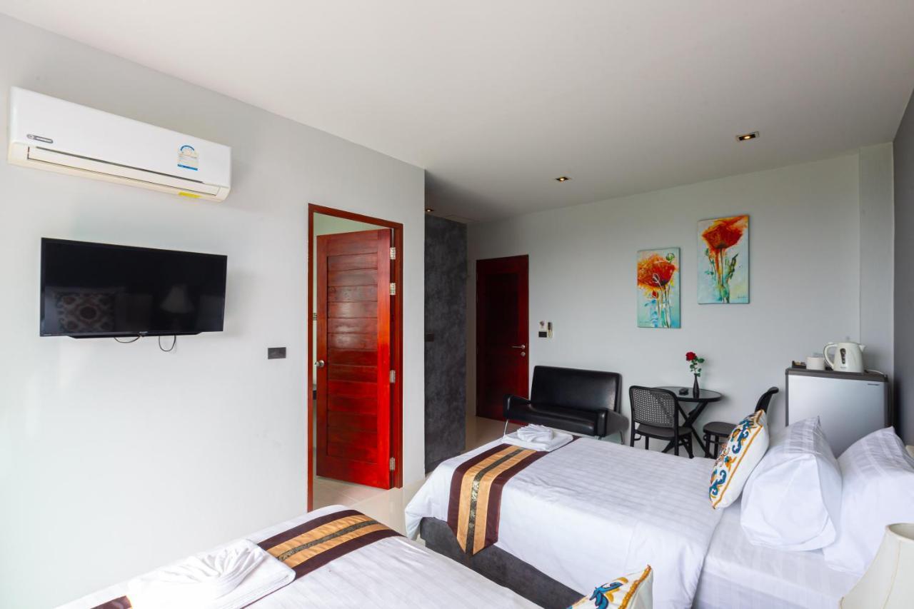 Rossarin Sea View Patong Hotel Exterior photo