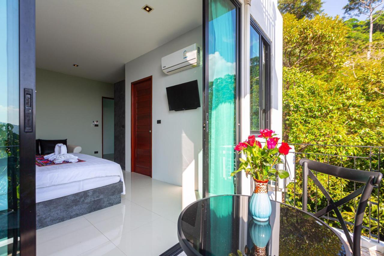 Rossarin Sea View Patong Hotel Exterior photo