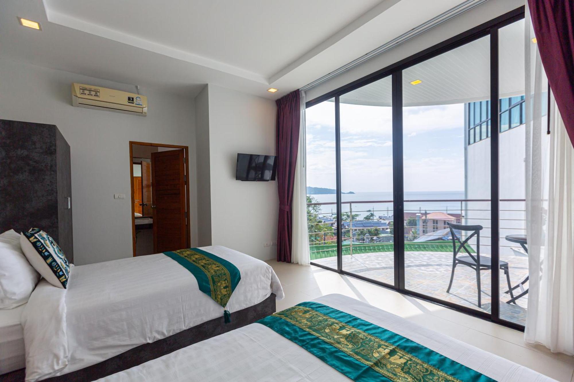 Rossarin Sea View Patong Hotel Exterior photo