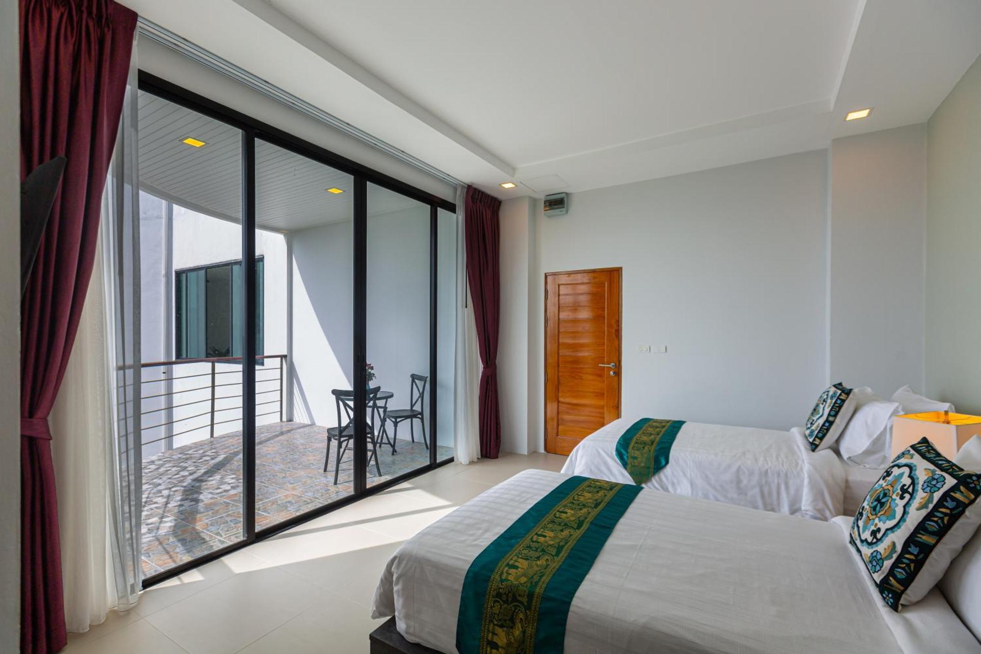 Rossarin Sea View Patong Hotel Exterior photo